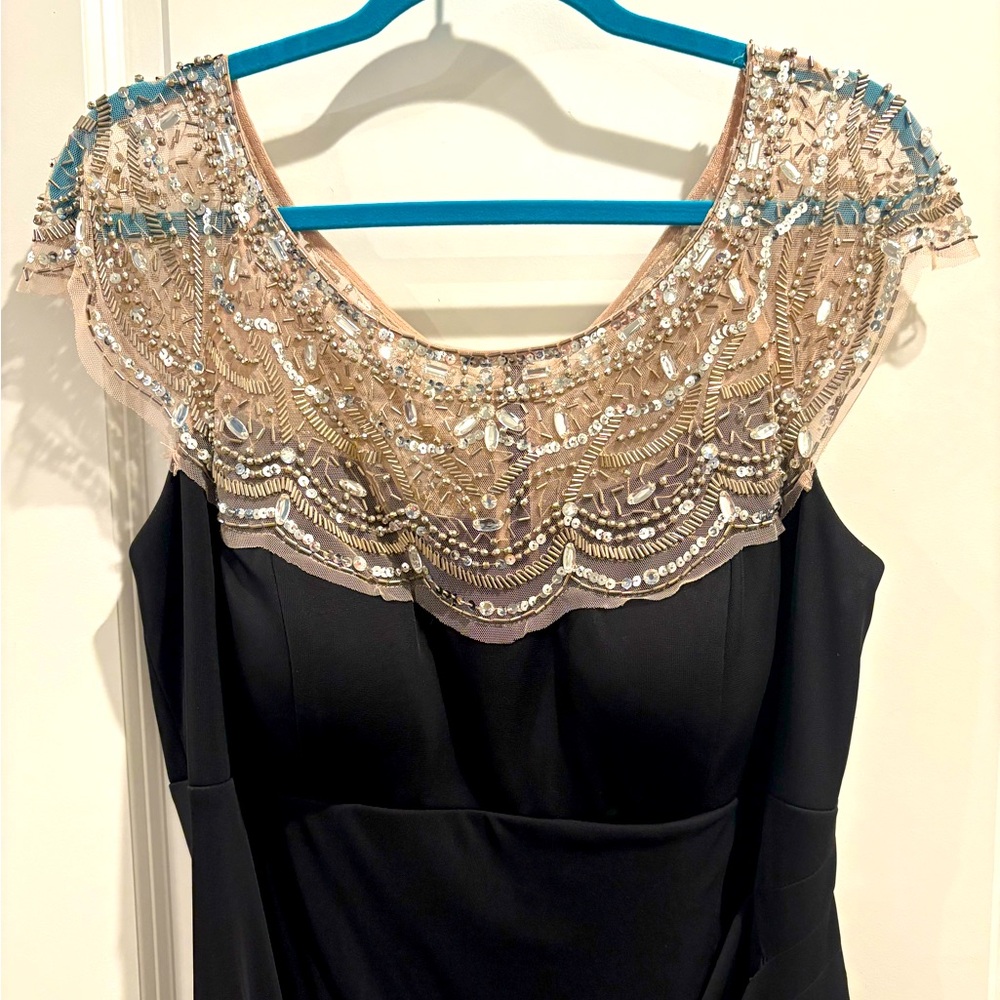 Elegant Black Dress with Beaded Neckline